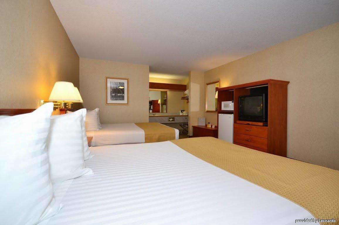 Oakridge Inn & Suites Rum bild