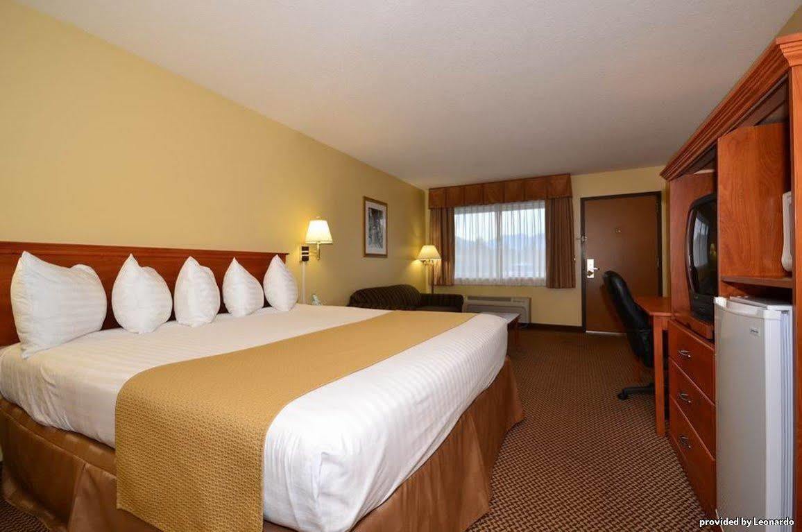 Oakridge Inn & Suites Rum bild