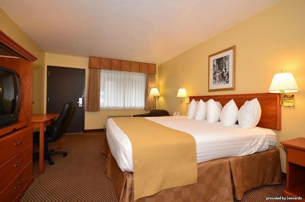 Oakridge Inn & Suites Rum bild